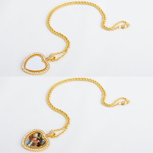 May include: Two gold necklaces with heart-shaped pendants. One pendant is blank, the other has a photo of a couple inside.