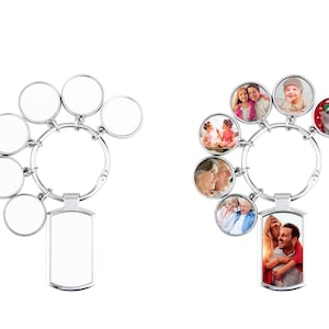 May include: Silver keyring with a large rectangular photo frame and six smaller circular photo frames. The larger frame has a photo of a couple, and the smaller frames have photos of a family and a dog.