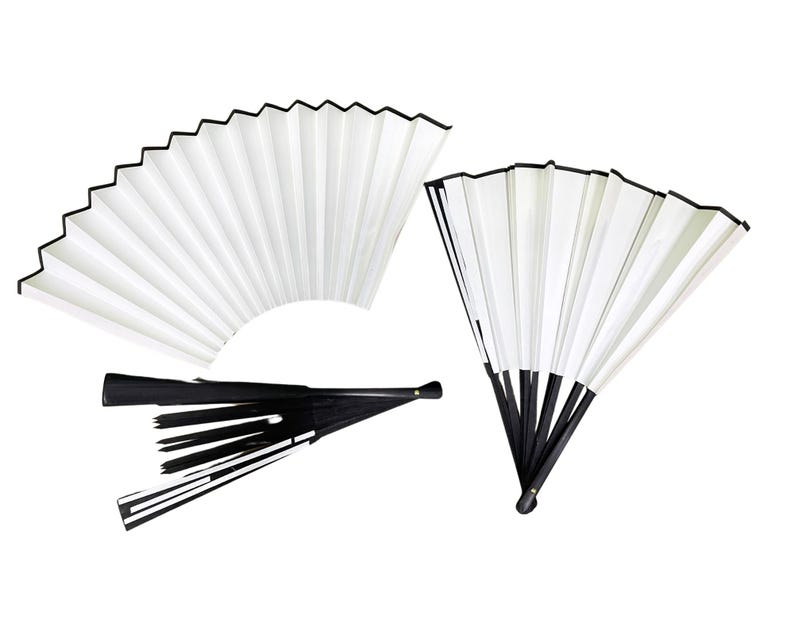 May include: Three folding fans, two with white paper and black trim, and one with black and white paper and black trim.