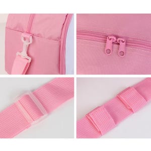 May include: Pink travel bag with a zipper closure and adjustable shoulder strap. The bag has a white accent on the front.