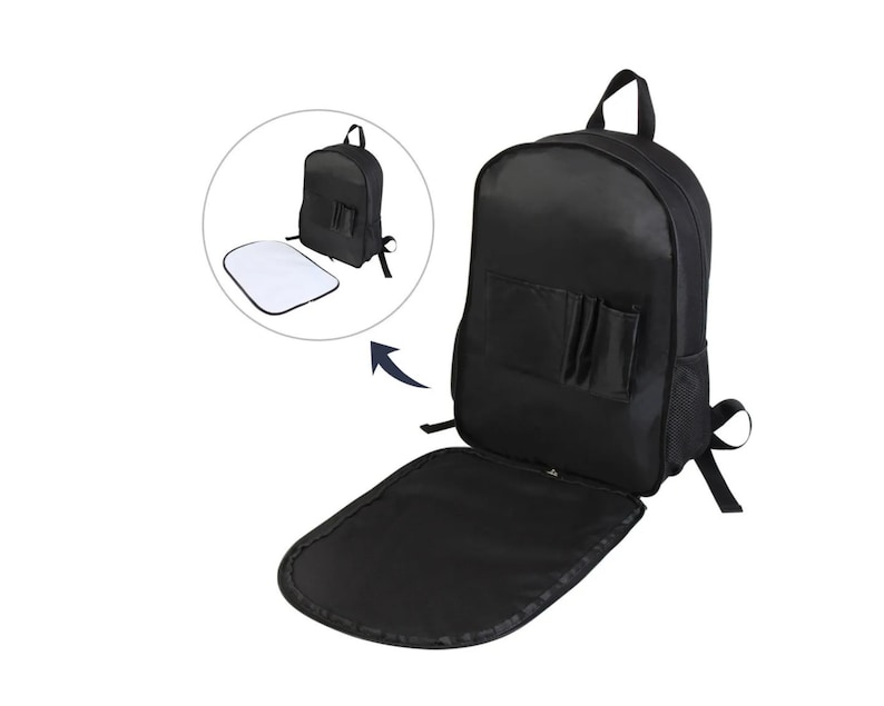 May include: A black backpack with a zippered pocket on the front and a mesh pocket on the side. The backpack is open and the inside is lined with a black fabric. The backpack is sitting on a white surface.