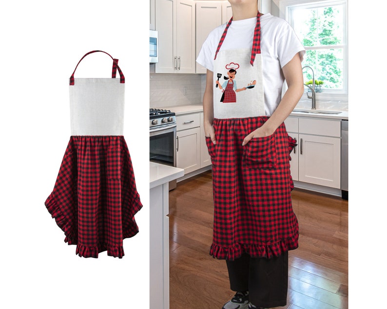 May include: A red and black checkered apron with a white ruffle trim and a white panel featuring a cartoon chef. The apron has two pockets.