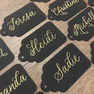 Black gift tags with gold handlettering