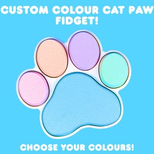 May include: A colorful cat paw-shaped fidget toy with a white outline, featuring five circular pads in pastel colors: pink, peach, lavender, and mint green, with a light blue paw base. Text reads "CUSTOM COLOUR CAT PAW FIDGET!" and "CHOOSE YOUR COLOURS!" on a blue background.