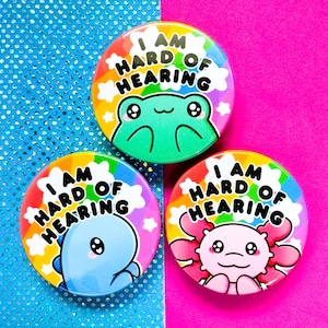 Hardhorenden pin button badge, communicatiemiddel, regenboog, kikker, dinosaurus, axolotl