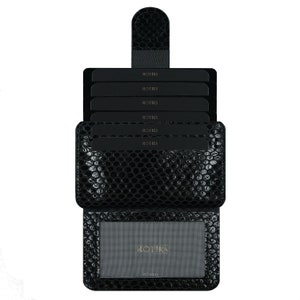 May include: Black leather card holder with a textured snake skin pattern. The card holder has six slots for cards and a clear window for an ID card. The brand name "ROTHYS" is printed on the front of the card holder.