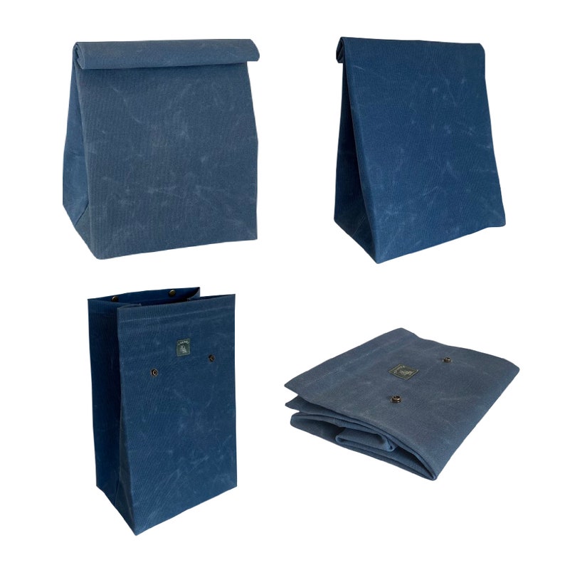 May include: Four blue canvas bags in different configurations. The bags are made of a sturdy, waxed canvas material and have a simple, utilitarian design. The bags are perfect for carrying groceries, books, or other items.