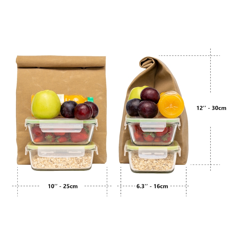 May include: A brown canvas lunch bag with a rolled top, filled with three glass containers of food. The containers are filled with strawberries, oatmeal, and plums. The bag is 10 inches wide and 12 inches tall.