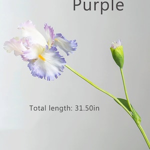 May include: Purple artificial iris flower with a white and purple flower head and a green stem. Total length: 31.50in.