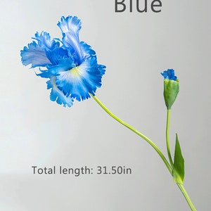 May include: A single blue artificial iris flower with a bud on a green stem. The flower is 31.50 inches long.  Blue.