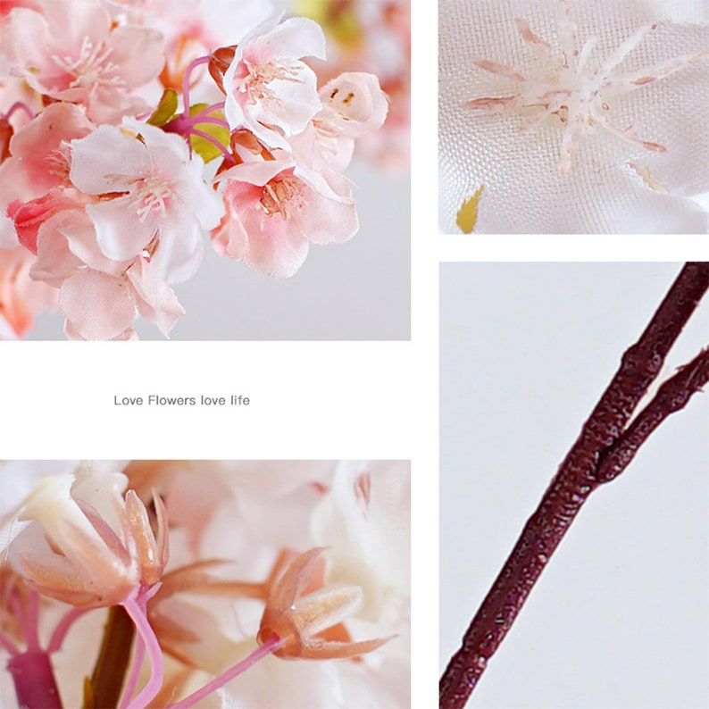 May include: Close-up of a pink artificial cherry blossom branch with a brown stem. The flowers are made of fabric and have a delicate, realistic appearance. The text "Love Flowers love life" is visible below the branch.