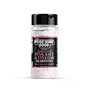 May include: A clear plastic bottle with a black lid filled with pink Himalayan salt and vinegar seasoning. The label reads "Pork King Good Presents Himalayan Pink Salt & Vinegar Seasoning". It also states "Gluten Free - No Sugar - No MSG - No Maltodextrin" and "Net Wt. 4.5 oz (127.5g)".
