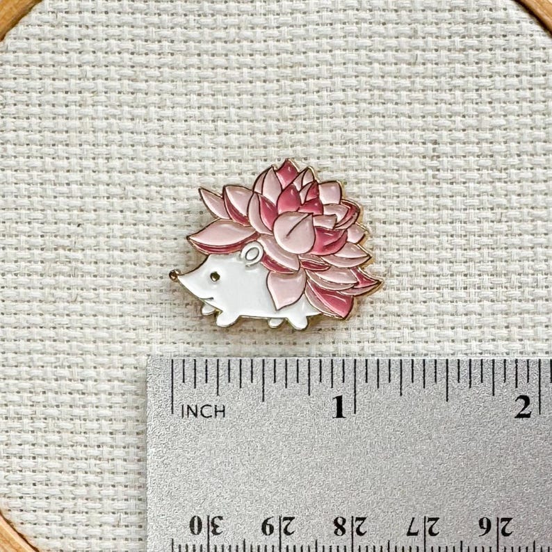 Hedgehog magnetic needle minder – cute woodland enamel accessory for cross stitch, embroidery, and needlepoint – adorable stitching gift for nature and animal lovers.