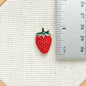 Magnetic red strawberry enamel needle minder for cross stitch, needlepoint, embroidery and sewing – cute fruit needle holder, strong needle magnet.