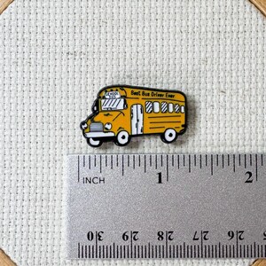 Yellow school bus magnetic enamel needle minder. Cute enamel accessory for cross stitch, embroidery, knitting, crocheting, sewing and needlepoint.