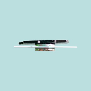 side view of enamel needle minder