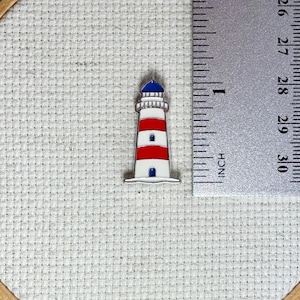 Lighthouse magnetic enamel needle minder – coastal-themed needle holder for cross stitch, embroidery, sewing, quilting, or needlepoint. Great gift for nautical or beach lovers.