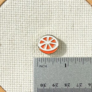 Magnetic orange enamel needle minder for cross stitch, embroidery, needlepoint and sewing – cute fruit needle holder, strong needle magnet.
