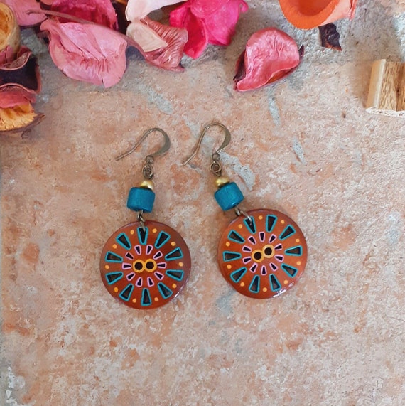 Puppets painted earring with coin hangings by KrutiArts | The Secret Label