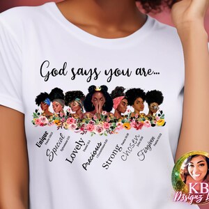 May include: White t-shirt with a graphic of seven black women with flowers and the text "God says you are..." with words like "Unique", "Special", "Lovely", "Precious", "Strong", "Chosen", and "Forgiven" below the women. Each word has a Bible verse next to it.