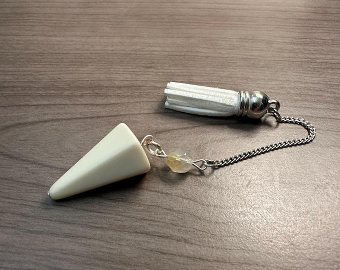 Pendulum Magic. Powerful Dowsing Tool to Connect you to Your Inner Wisdom. Featuring Silver hardware and Unique White Faceted Bead.