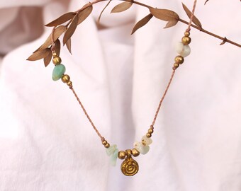 Collier « Negombo » en or avec pierres précieuses et pendentif en spirale