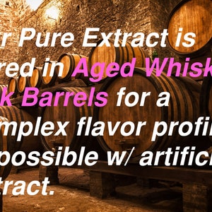 May include: A row of wooden barrels stacked in a brick cellar. The text "Our Pure Extract is cured in Aged Whiskey Oak Barrels for a complex flavor profile impossible w/ artificial extract." is superimposed on the image.