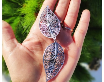 Hoja labrada grande sin botones clips - México