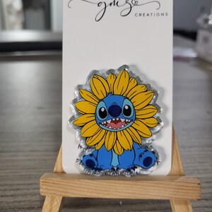 Blue monster sunflower badge reel