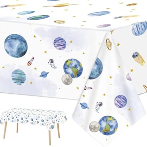 May include: A white plastic tablecloth with a space theme. The tablecloth features a watercolor design of planets, stars, and an astronaut. The tablecloth is perfect for a space-themed party.