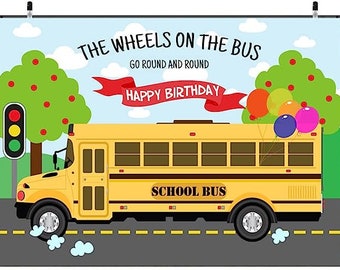 May include: A yellow school bus with the words "The Wheels on the Bus Go Round and Round Happy Birthday" and "School Bus" printed on the side. The bus is driving on a road with a traffic light and two trees with red apples on them. There are colorful balloons floating in the air.