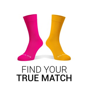 May include: Two pairs of socks, one pink and one yellow, with the text "NO TELL NO RETURN" and "NO LEFT NO RIGHT" on the bottom of each sock. The text "FIND YOUR TRUE MATCH" is below the socks.
