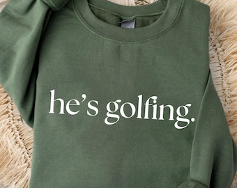 He's Golfing Sweatshirt, Golfing Season Hoodie, Golfer Wife Crewneck, Golfing Mom, Golf Player for Mom, Golf Lover Pullover