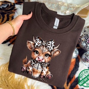 Cute Highland Cow Coffee Sweatshirt, Leopard Bow Iced Latte Cowgirl Sweater, Boho Farm Animal Graphic Hoodie, Cozy Western Coffee Lover Top