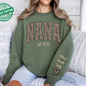 Custom Leopard Nana Sweatshirt With Kid Name On Sleeve, Personalized Nana Sweatshirt, Gift For Nana, Christmas Gift Nana Est 2026 Hoodie