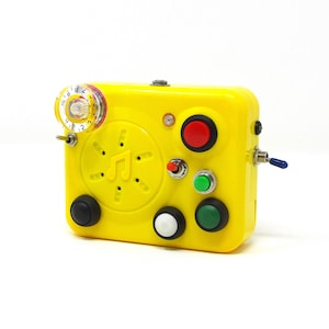 Rund verbogenes Guitar-in-a-Box; Experimentelles Musikinstrument