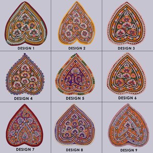 May include: Nine different heart-shaped designs featuring intricate embroidery and mirror work. Each design showcases a unique combination of colours and patterns, including yellow, orange, red, pink, green, blue, and purple.