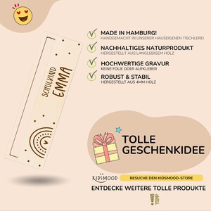 May include: A personalized wooden schoolchild name tag with a rainbow design. The tag is made in Hamburg, Germany and is a sustainable natural product. The text on the tag reads "Schulkind Emma".