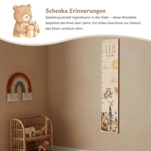 May include: A wooden growth chart featuring a printed scale and watercolor illustrations of a sun, clouds, an owl, a bear, a fox, and trees. The name LEO and the date 02.04.2021 are printed at the top of the vertical board.