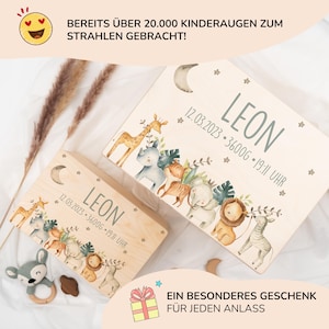 May include: Two wooden boxes with a light wood finish and a whimsical jungle animal design. The boxes are personalized with the name "LEON" and the date "12.03.2023 - 3600g - 19:11 UHR". The boxes are perfect for storing keepsakes or gifts.
