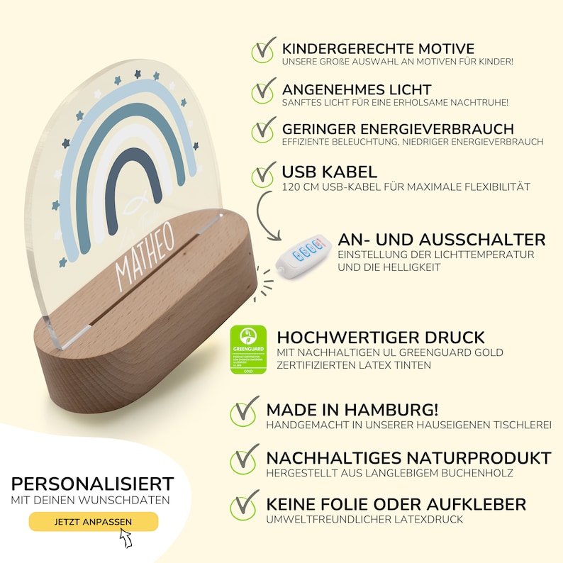 May include: A personalized rainbow night light with a wooden base. The light features a blue and white rainbow with stars and the name "MATHEO" on the bottom. The light has a remote control for adjusting the brightness and color temperature. The product is made in Hamburg, Germany, and is made from sustainable materials.