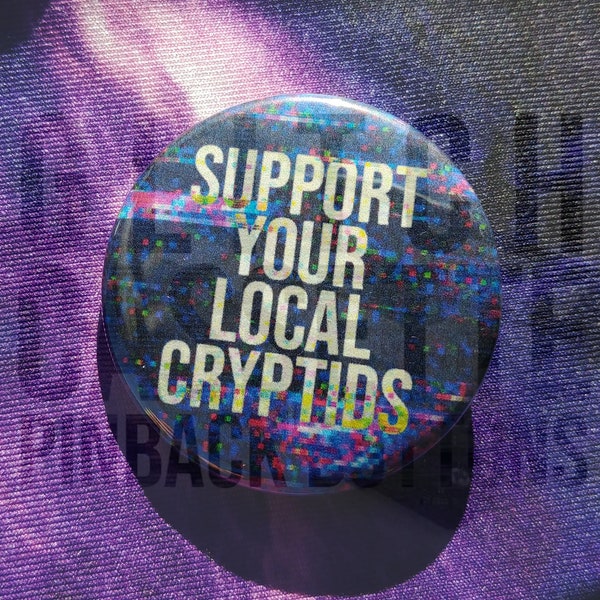 Glitch pinback "Support your local cryptids" button, 1.5"