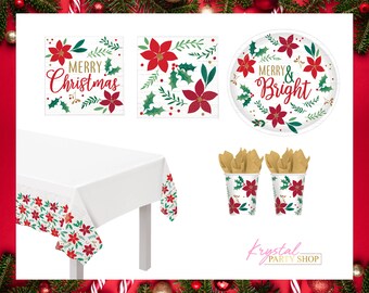 May include: A Christmas party table setting with a white tablecloth with a red and green border, two red and green cups, two gold napkins, a red and green paper plate with the text "Merry & Bright", and two red and green napkins with the text "Merry Christmas".