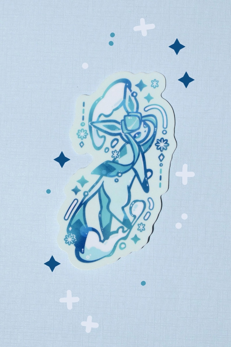 May include: A light blue sticker featuring a stylized illustration of a mythical creature with flowing lines and floral accents. The design incorporates shades of blue and white, with star and dot details. The sticker is on a light blue background.
