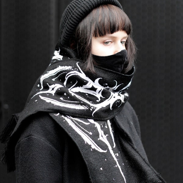 Black scarf with white ornament