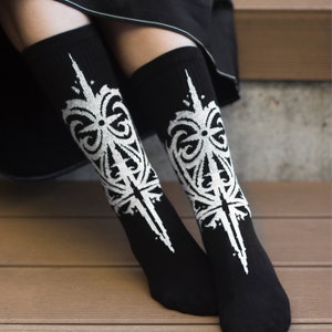 Black socks with white ornament