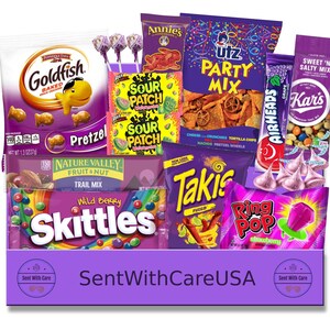 May include: A purple gift basket filled with snacks and candy. Includes Goldfish crackers, Skittles, Sour Patch Kids, Utz Party Mix, Takis, Airheads, Ring Pop, and other treats. The basket has the text "SentWithCareUSA".