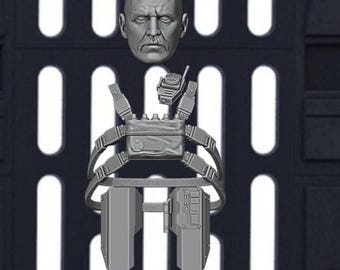 May include: A gray, 3D-printed action figure head with a mustache and a tactical vest with pouches and straps. A walkie-talkie is attached to the vest. The figure is set against a dark background with vertical and horizontal lines.