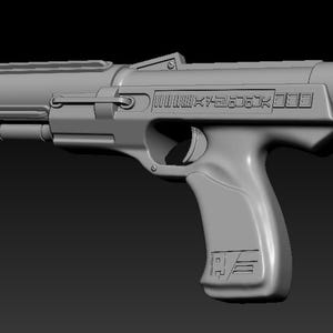 May include: A grey plastic toy gun with a black barrel and a textured grip. The gun has a series of numbers and letters printed on the side.