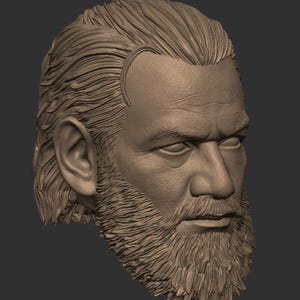 May include: A 3D printed bust of a man with a beard and long hair. The bust is sculpted in a realistic style and shows the man's face in profile.